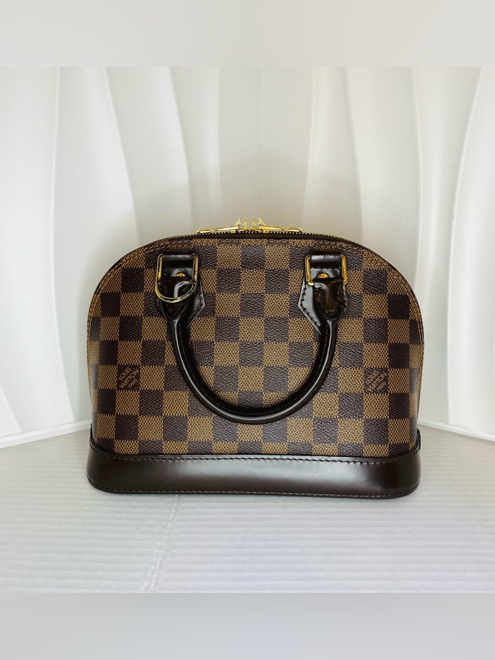 Louis Vuitton Brown Checkered Alma Satchel with Dark Brown Trims